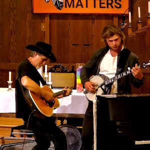 Still Picking dueling guitar and banjo players at BUC concert